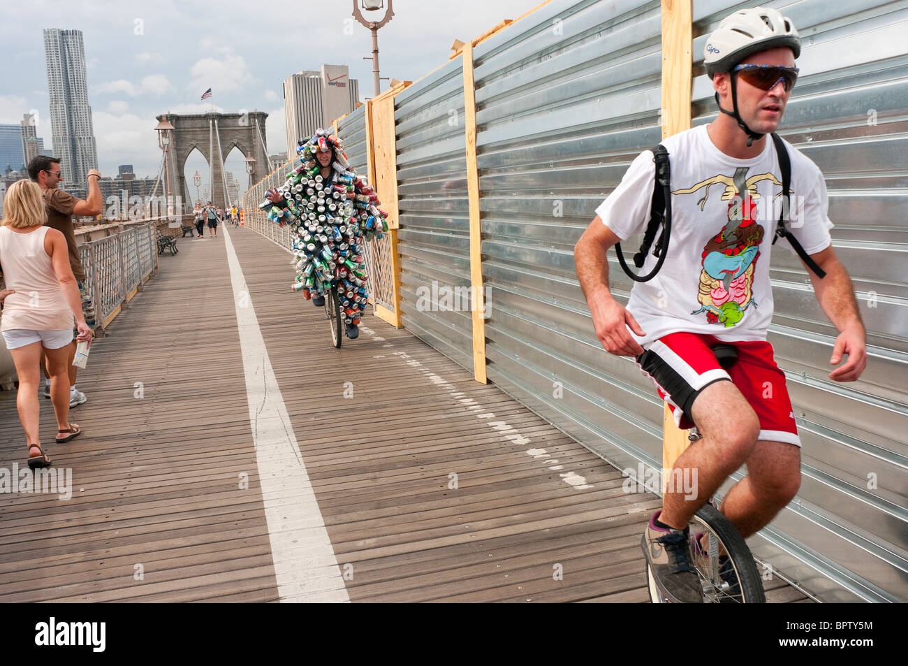 Gene Pool, aka The Can Man, crossing the Brooklyn Bridge on his