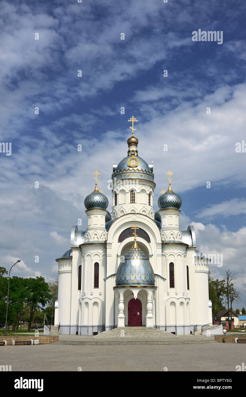 church under blue cloudy sky Stock Photo - Alamy