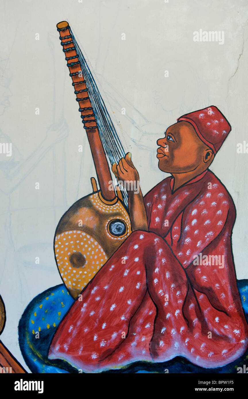 mural depicting a kora player, the Gambia Stock Photo
