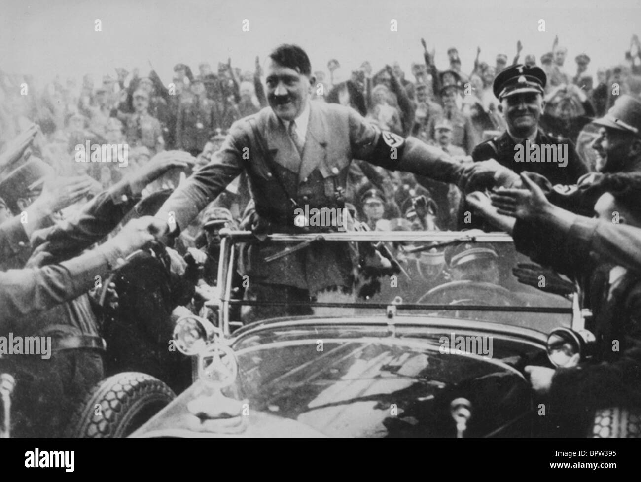 ADOLF HITLER & BODYGUARD AT A RALLY FUHRER OF GERMANY 30 May 1933 NURENBURG Stock Photo