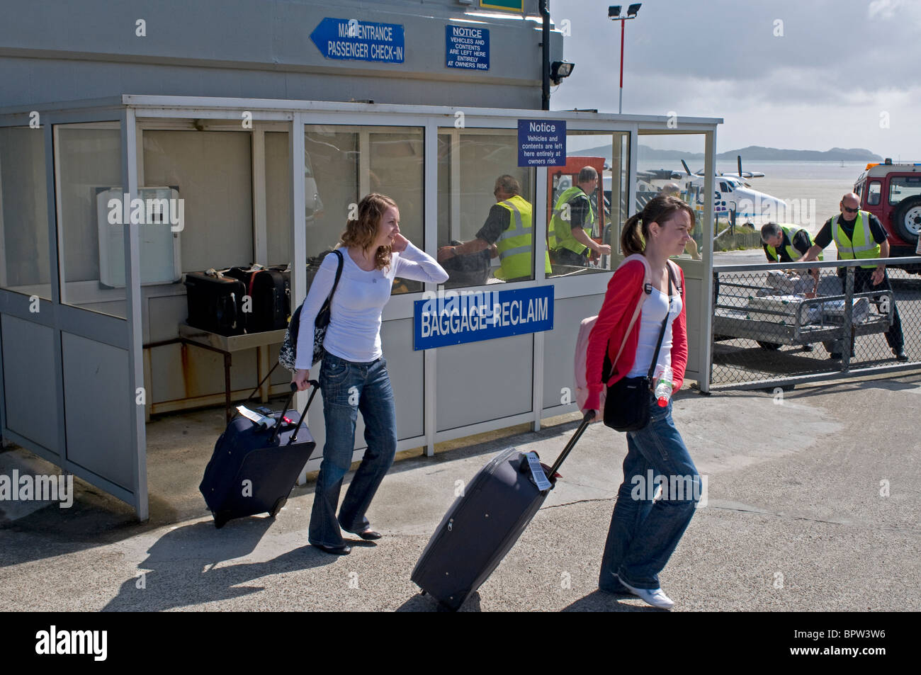 Passenger Luggage collection at Barra Island airstrip,   SCO 6516 Stock Photo