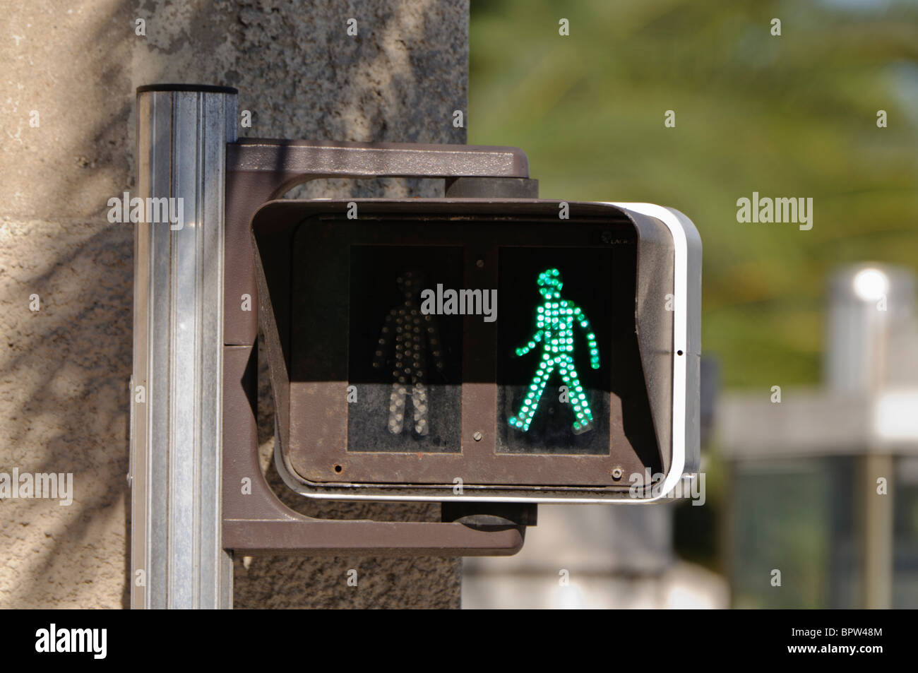 Green-man at a French pedestrian crossing Stock Photo