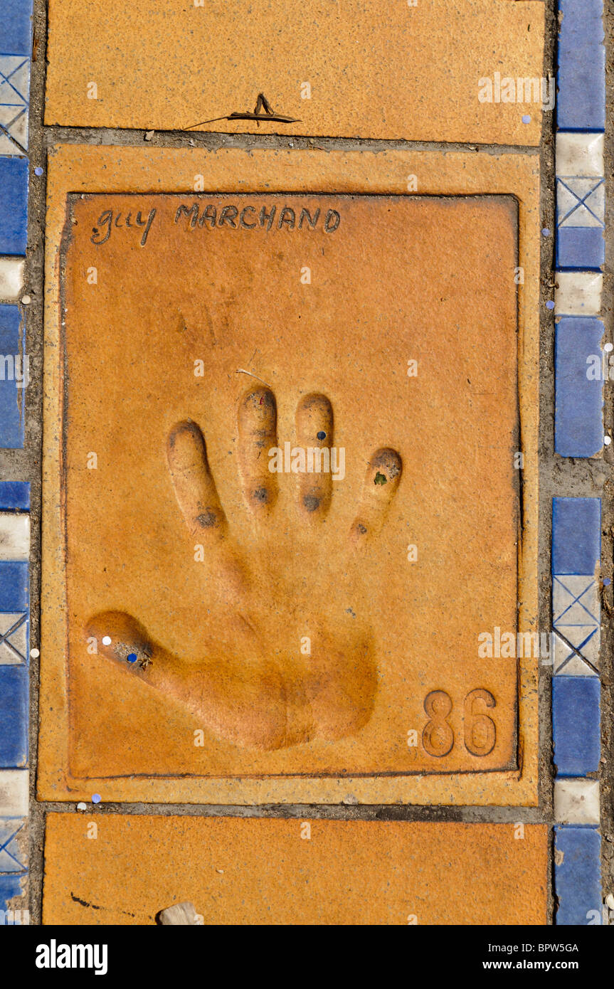 Clay handprint of actor Guy Marchand outside the Palais des Festivals et des Congrès, Cannes Stock Photo