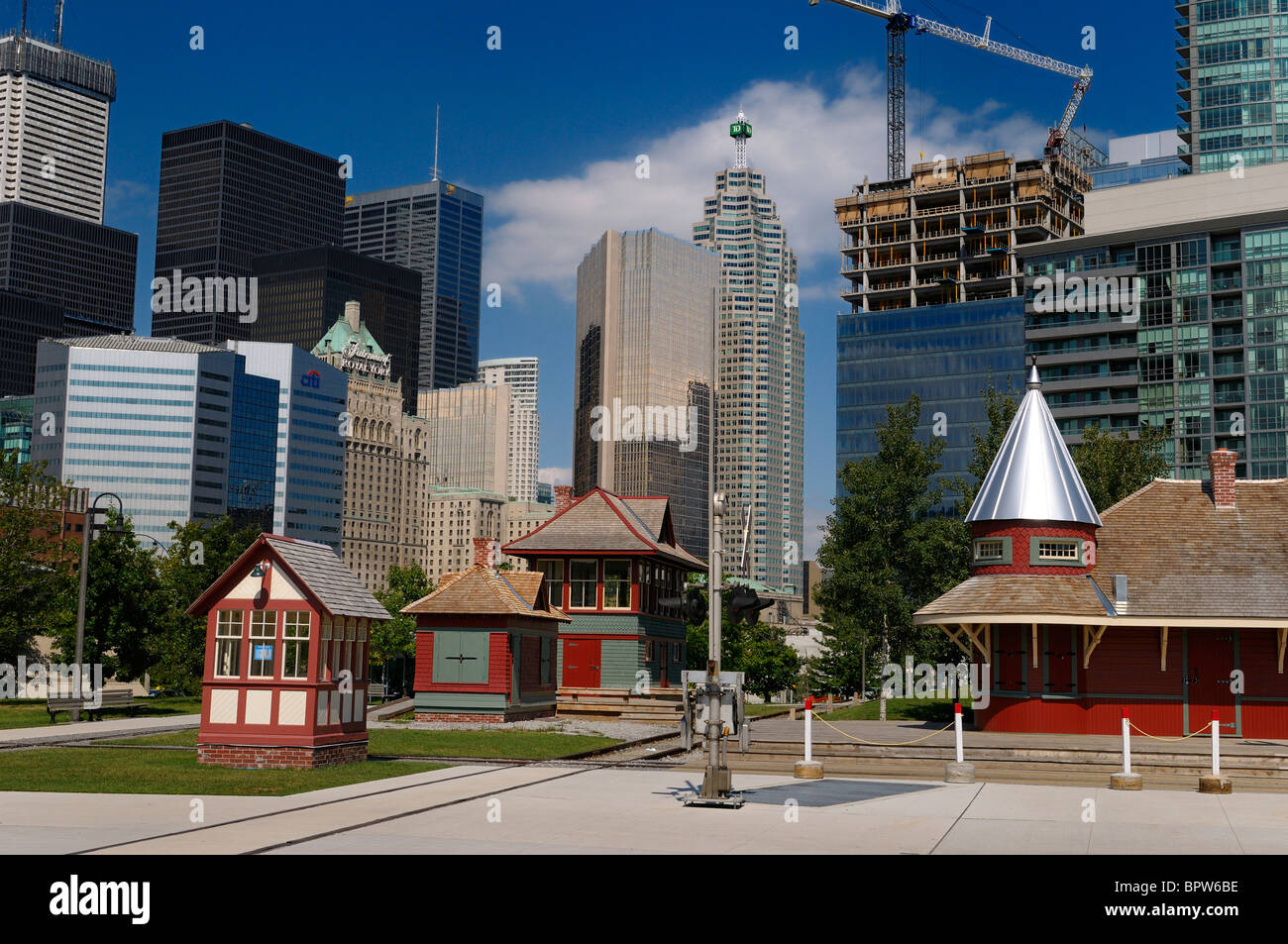 Historic railway buildings at the John street Roundhouse Park with Toronto skyline Stock Photo