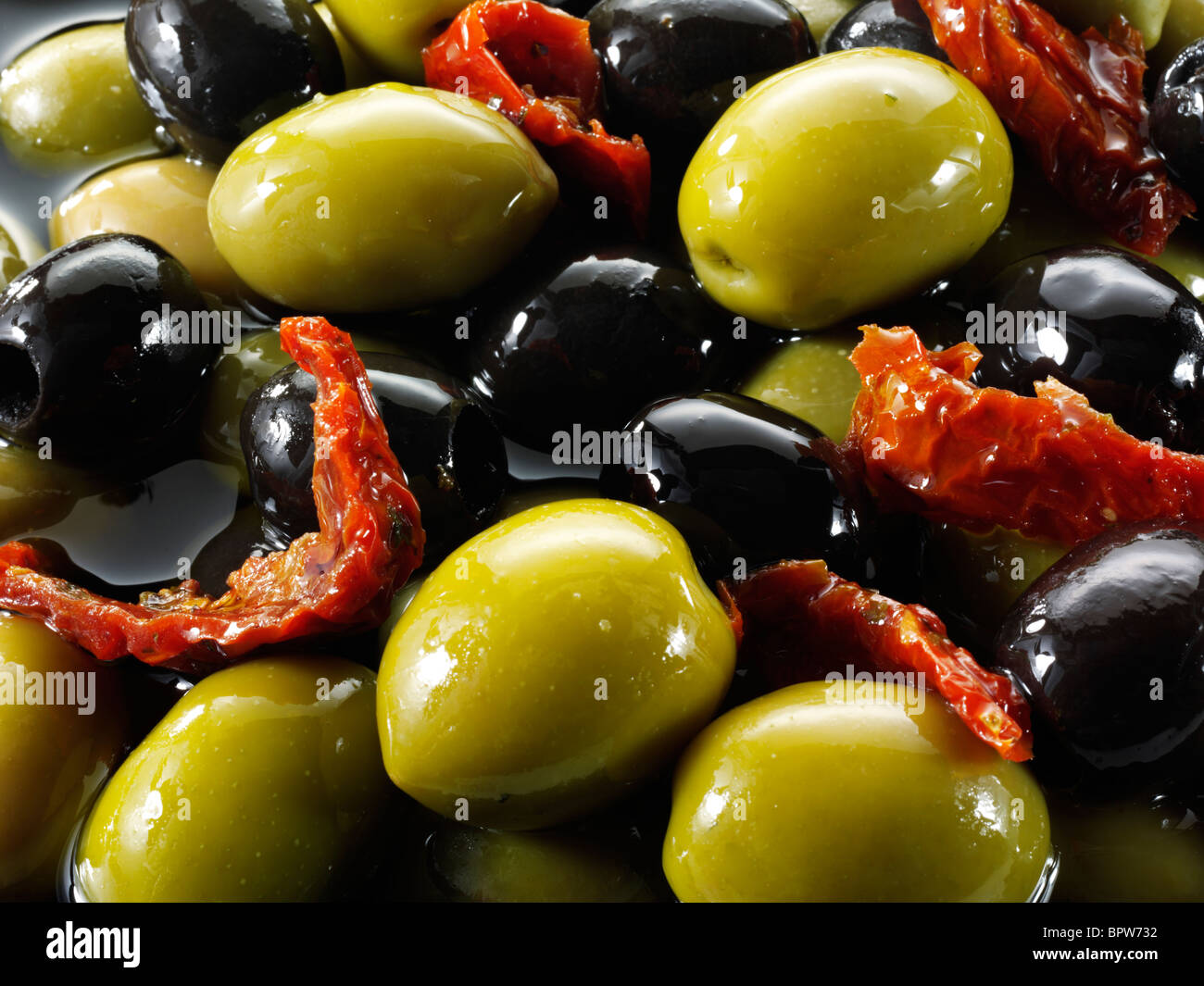 Fresh mixed black and green olives photos, pictures & images. Stock Photo