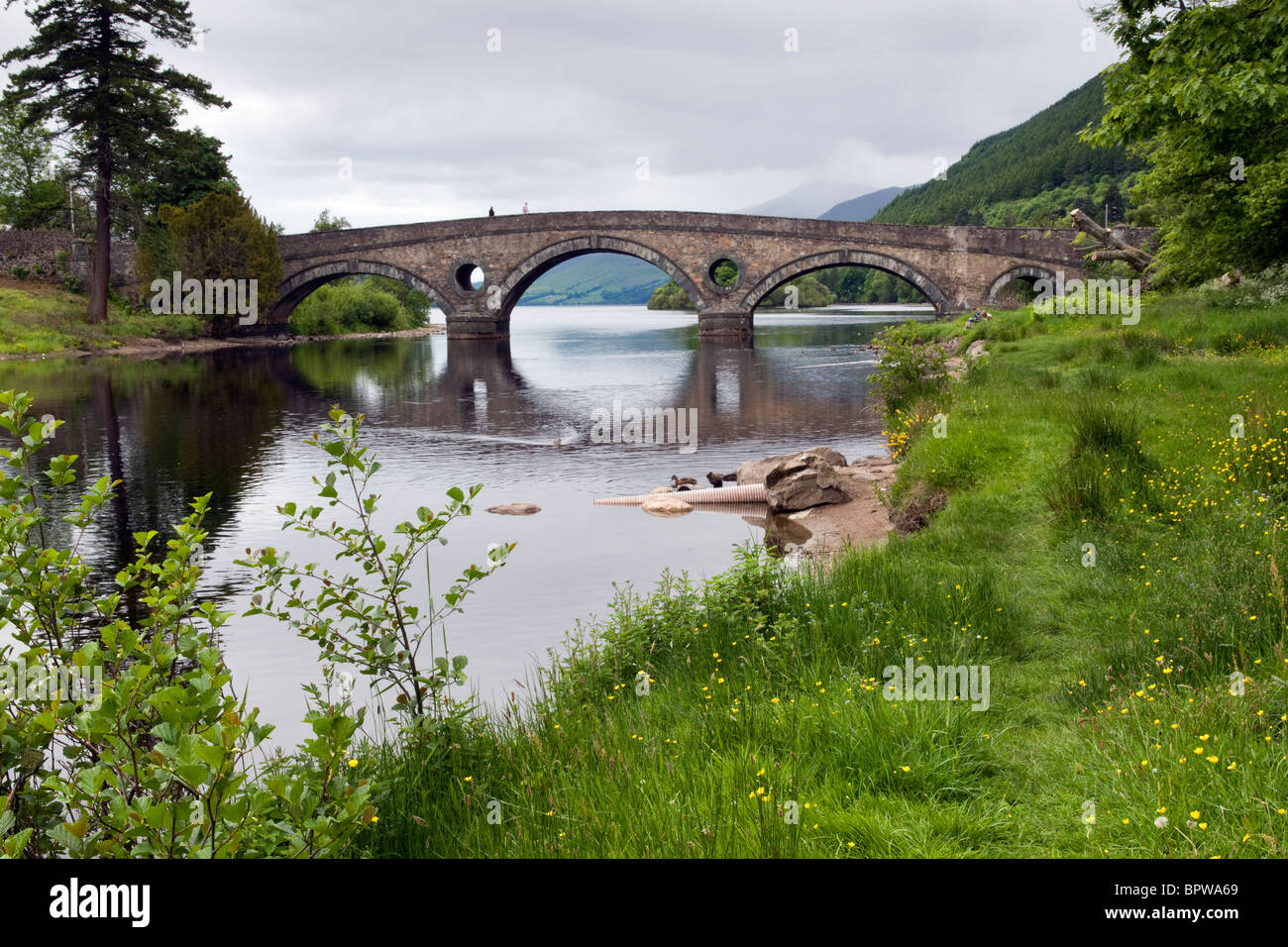 Kenmore bridge at Kenmore over the river Tay looking out over loch Tay and towards Ben Lawers mountain range Stock Photo