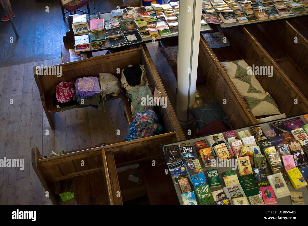 Jumble of hand books for sale on chapel pews england hires stock