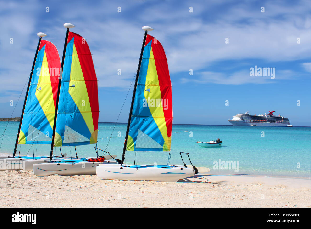 Different types of water vessels like a cruise ship, a motor boat, and