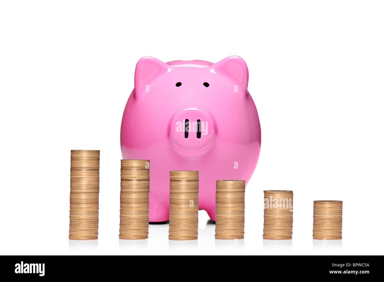 Stack of coins in front of pink piggy bank showing growth Stock Photo ...