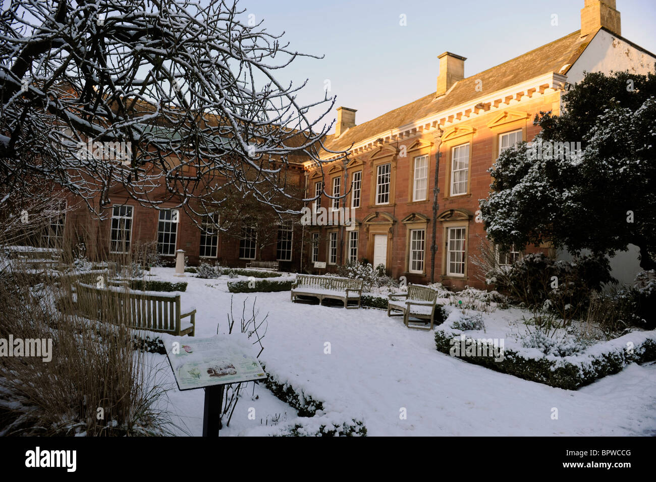 Gardens of Tullie House Museum and Art Gallery, Carlisle, Cumbria covered in winter snow Stock Photo