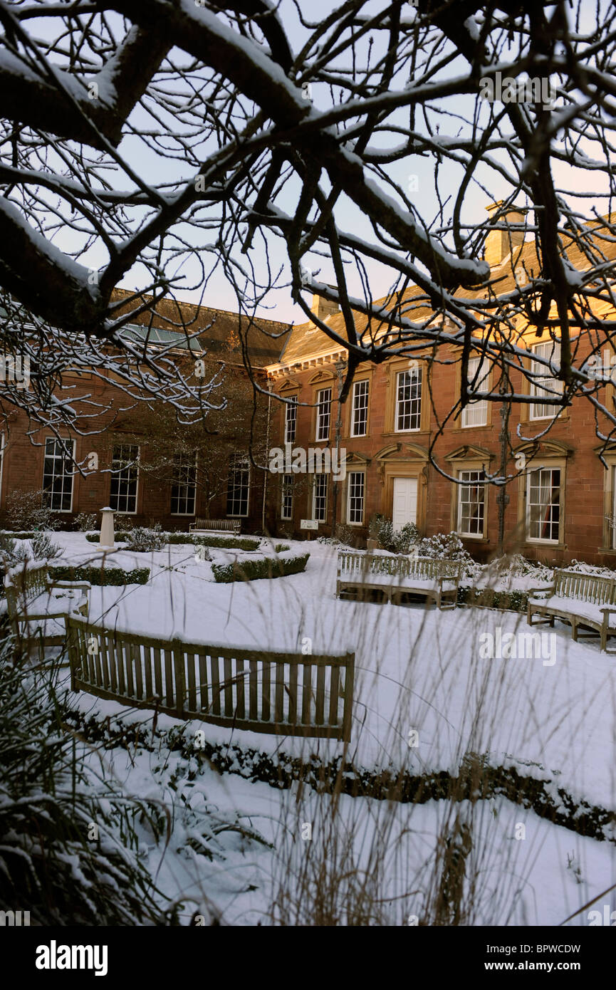 Gardens of Tullie House Museum and Art Gallery, Carlisle, Cumbria covered in winter snow Stock Photo