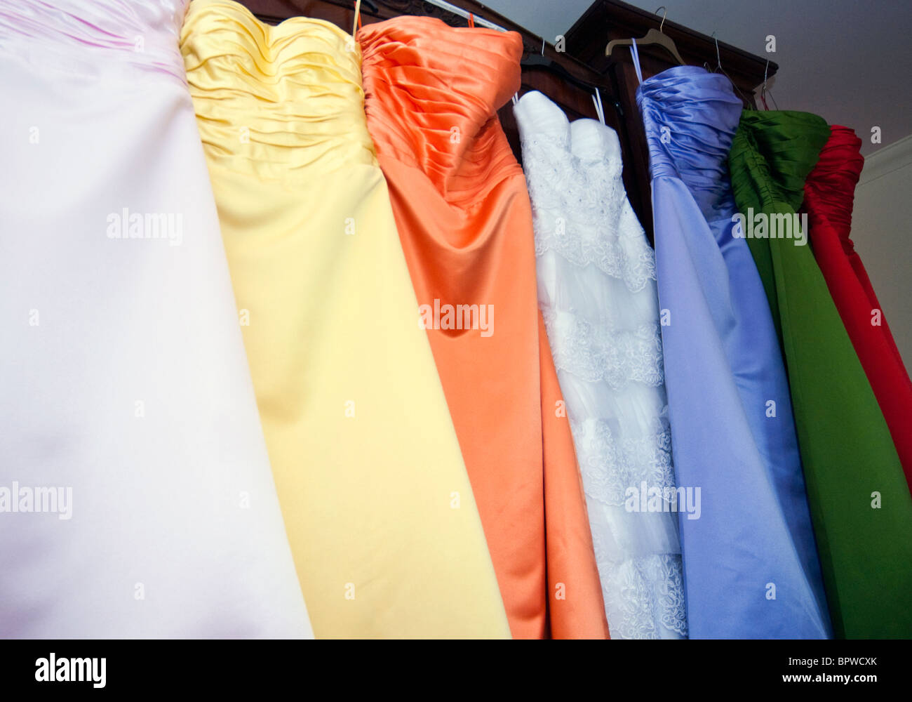 colorful wedding and bridesmaid dresses Stock Photo
