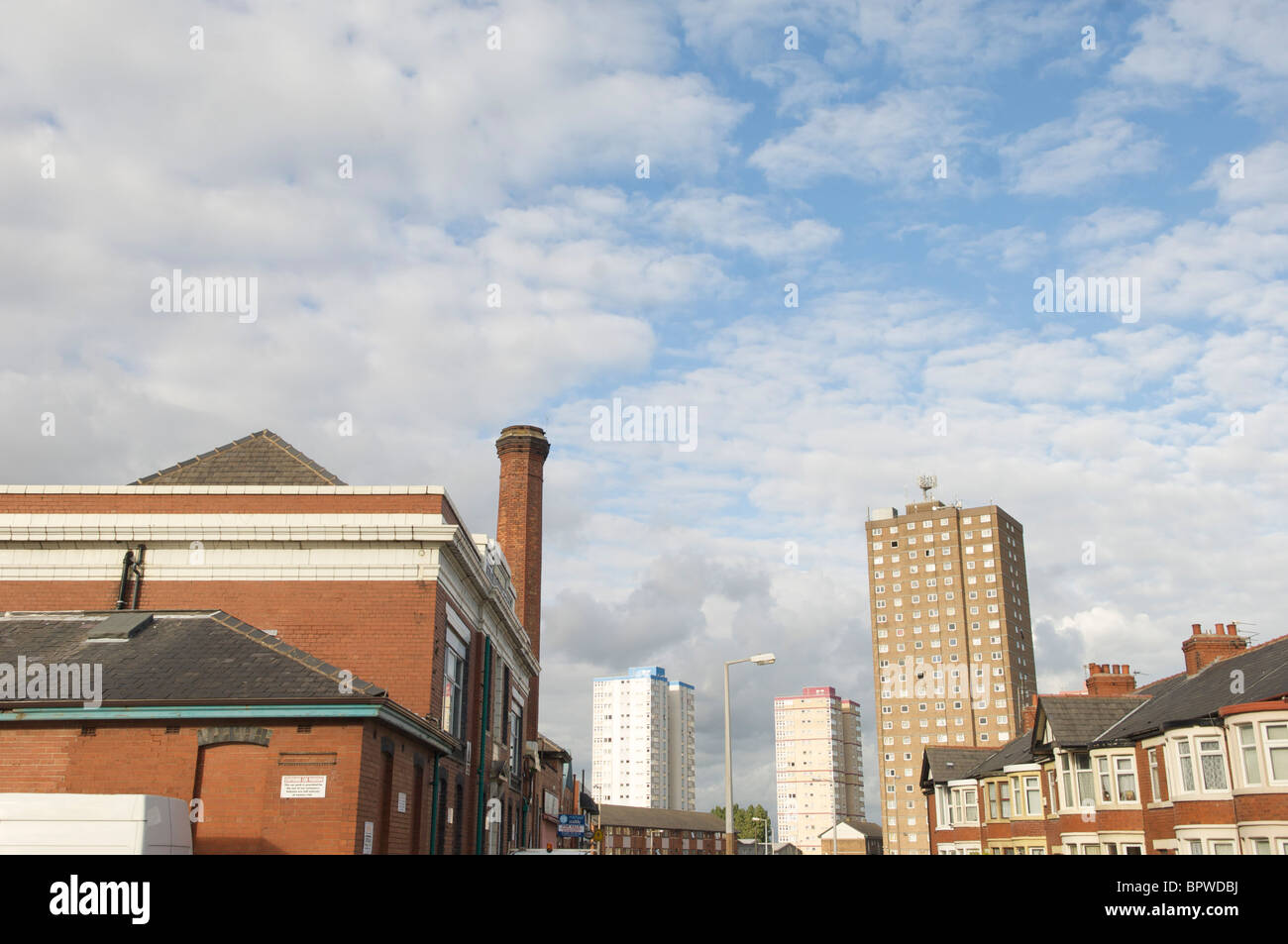 Old laundry building and high rise flats in Layton Blackpool Stock