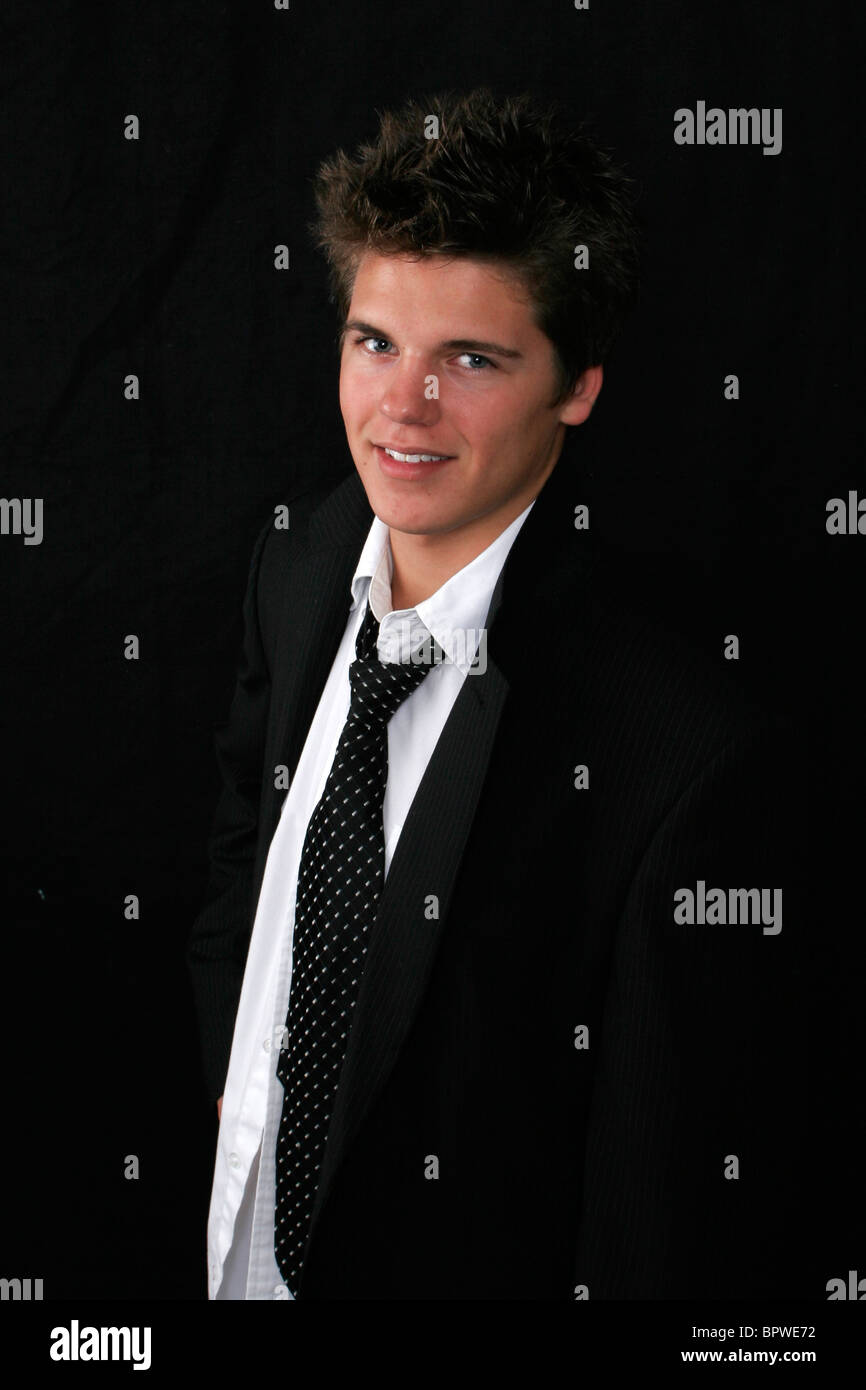 portrait of a handsome young man in black suit Stock Photo