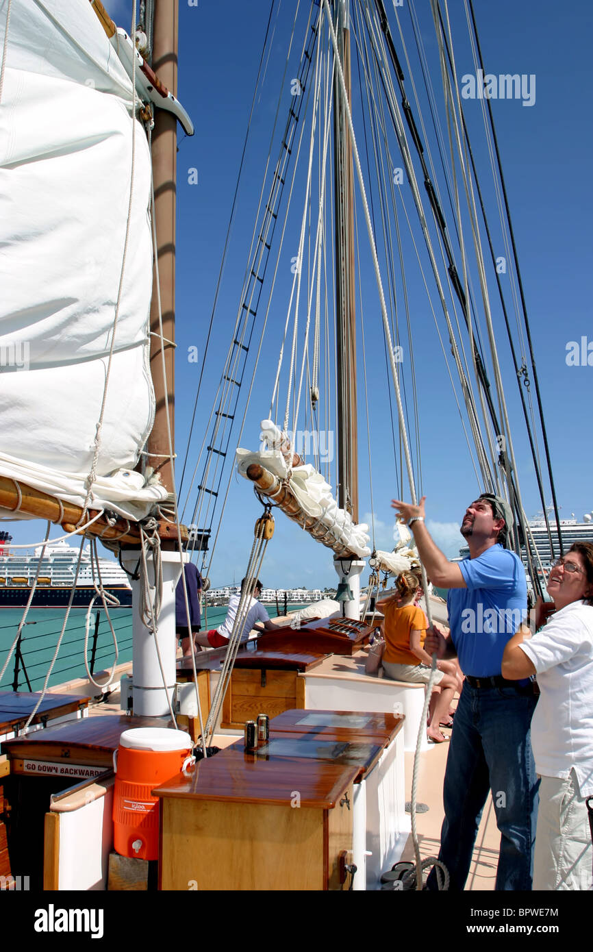 Sailing crew member on sailboat during regatta Stock Photo