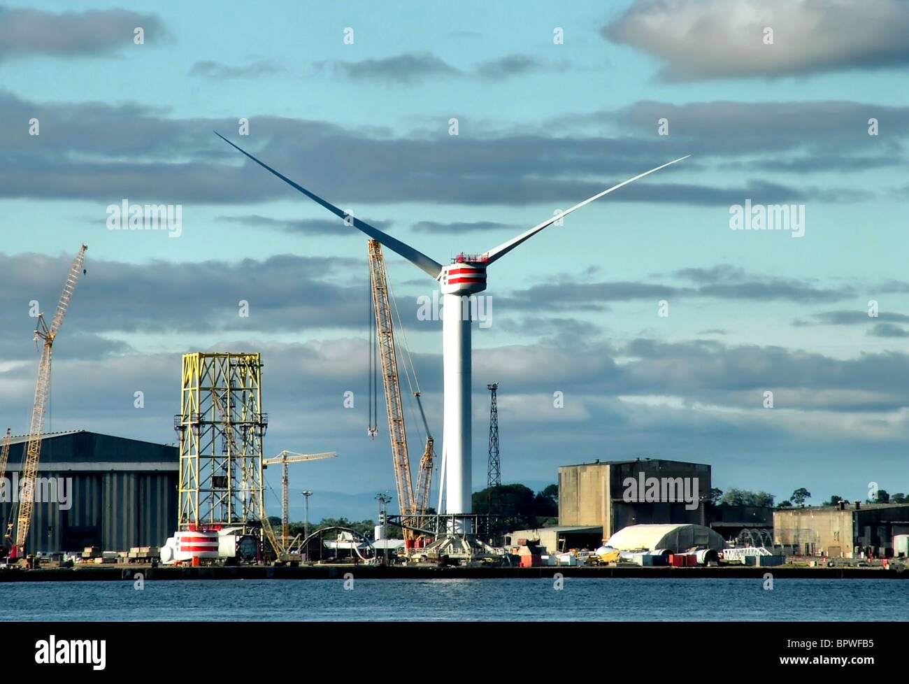 A giant off-shore wind turbine assembled and ready for installation at the Nigg Yard, Cromarty Firth. Stock Photo