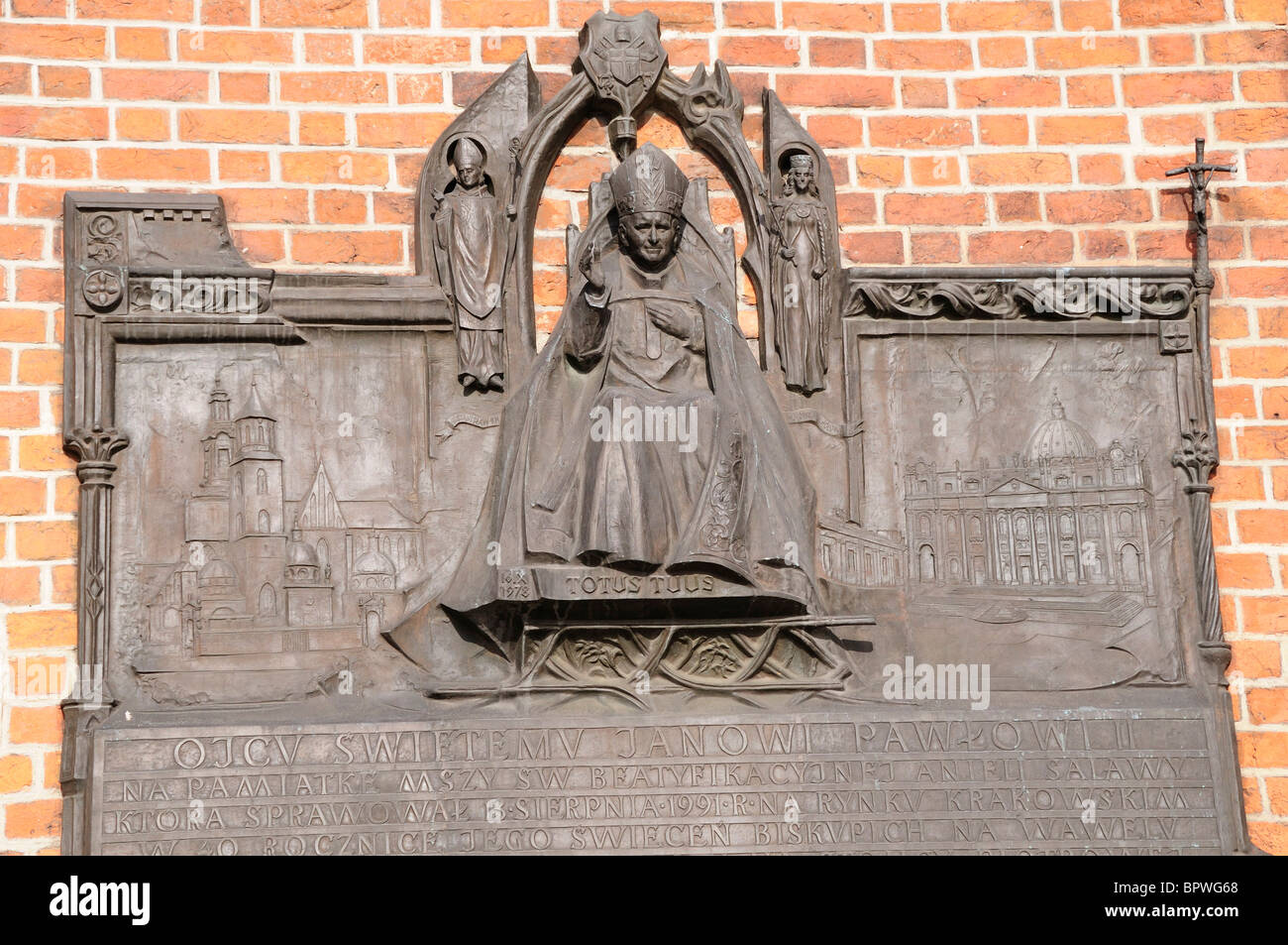 Detail of John Paul II plaque, in Mariacki Church, St Mary's Church in Rynek Glowny, Town Square in Krakow Stock Photo