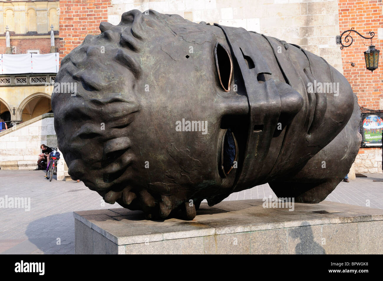 Giant head sculpture on Rynek Glowny, Town Square in Krakow Stock Photo