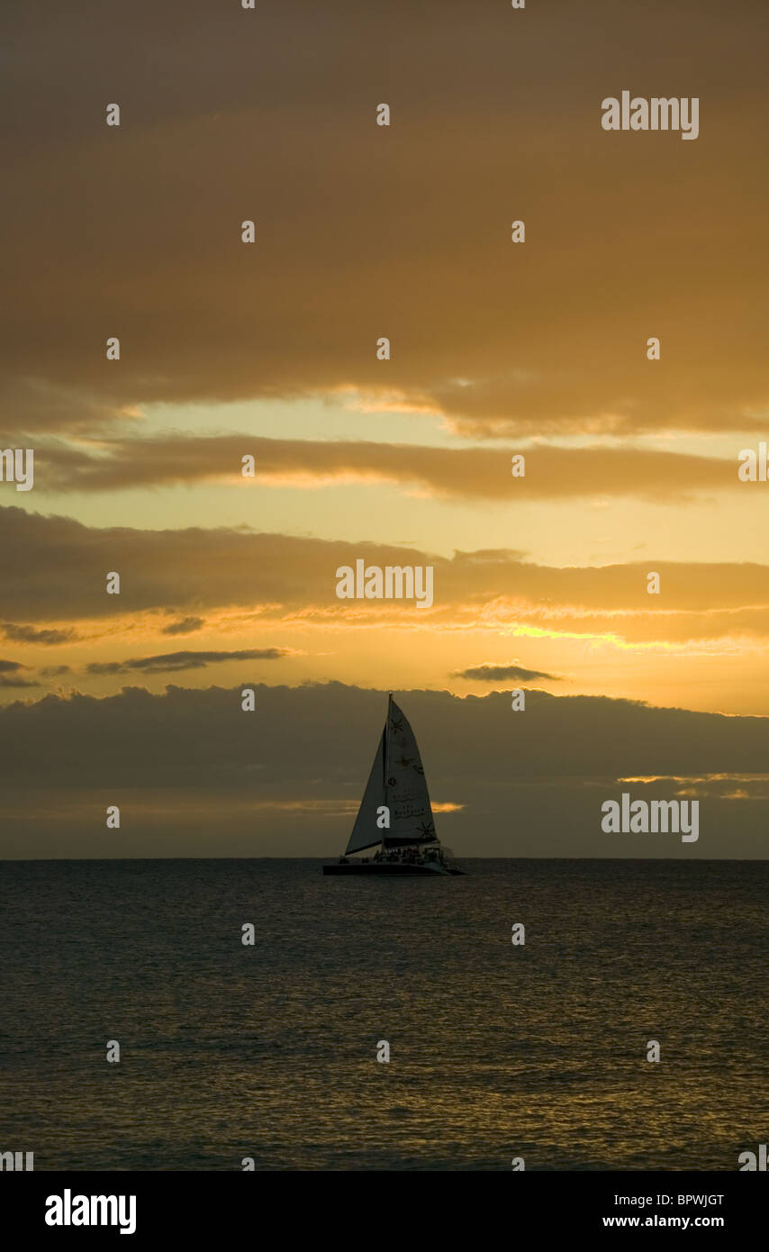 Sailing boat at sunset hi-res stock photography and images - Alamy