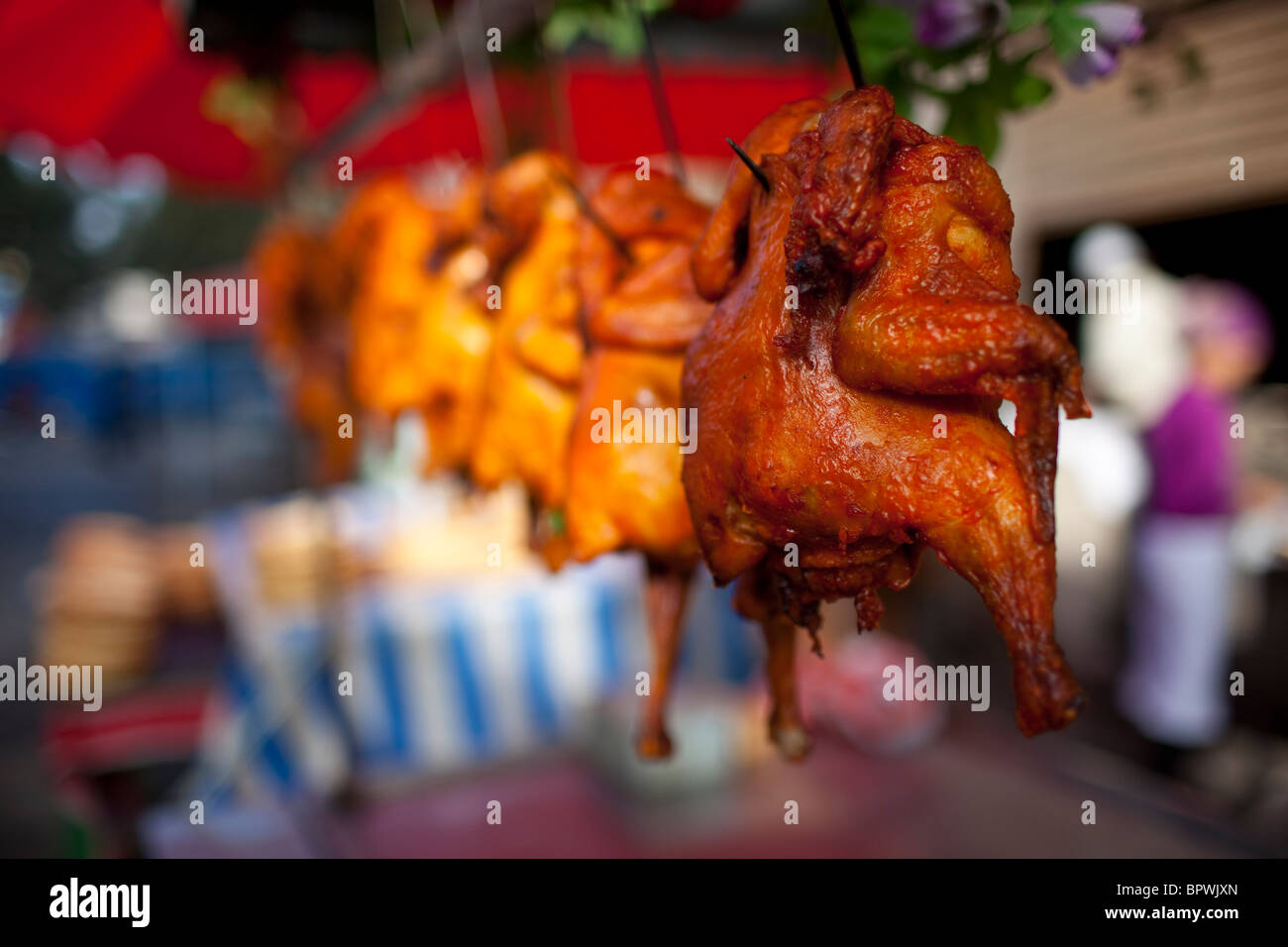 Grilled chicken for sale at the bazaar in Yarkand, Xinjiang, China. Stock Photo