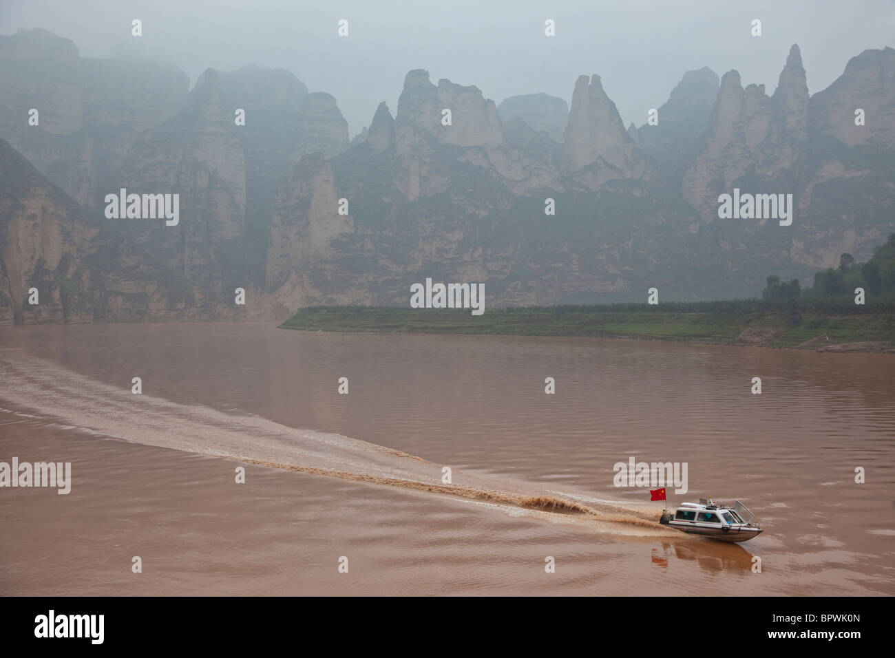 Speed boat on Yellow River near Bingling Si, Gansu Province, China. Stock Photo