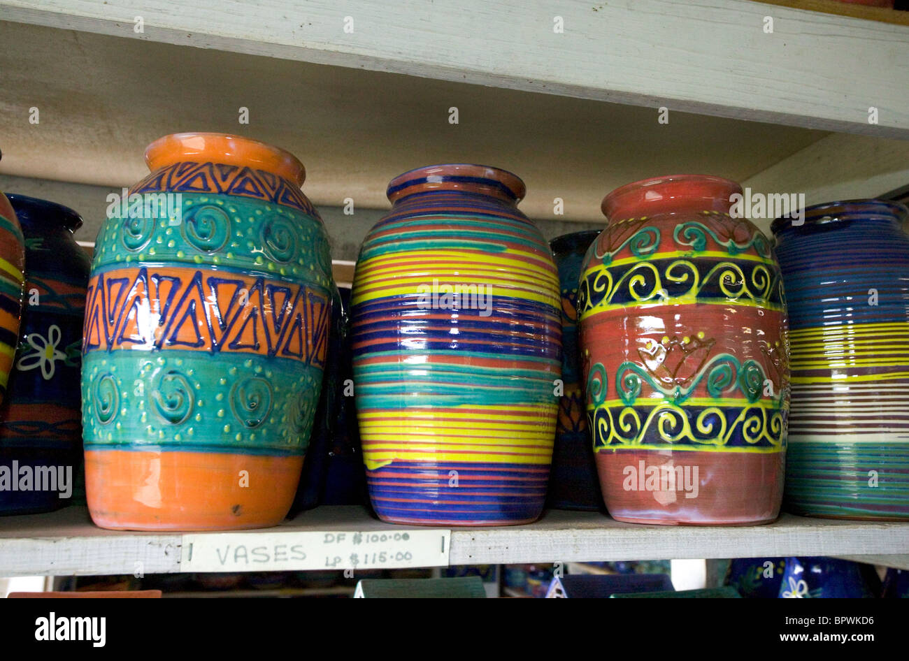Colourful pottery for sale in the studio at the Earthworks Pottery in the parish of Saint James Stock Photo