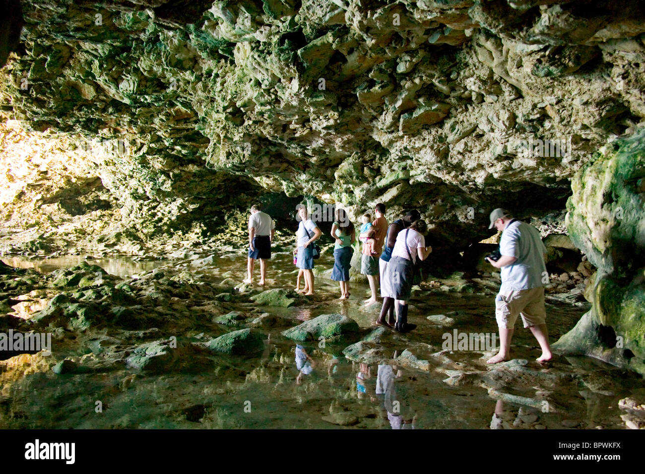 People in the cave at Animal Flower Cave in the parish of Saint Lucy in Barbados in the Caribbean Islands Stock Photo