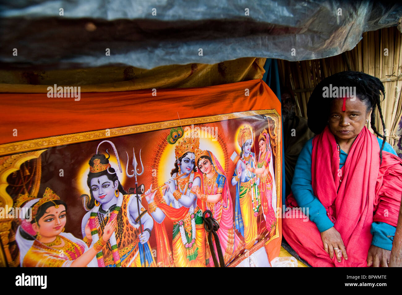 A sadhvis - Hindu holy woman at the Gangasagar mela. Stock Photo