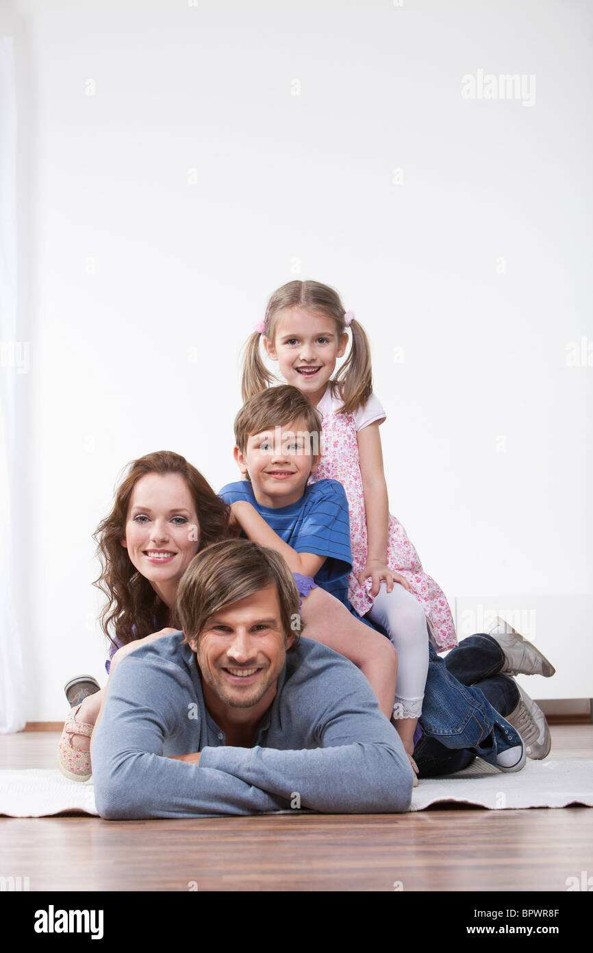 Young happy family cut out hi-res stock photography and images - Alamy