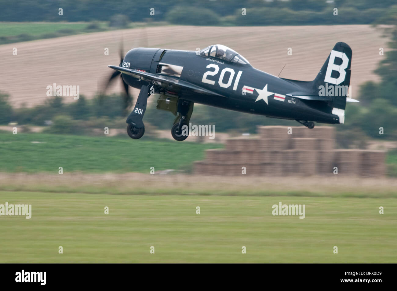 Grumman F8F Bearcat taking off from Duxford Stock Photo