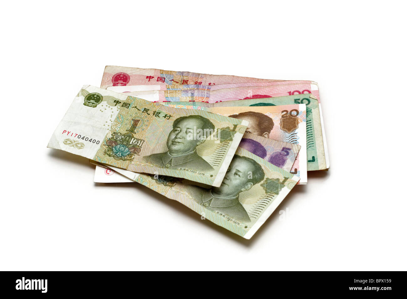 Chinese Yuan banknotes in various denominations on a white background Stock Photo