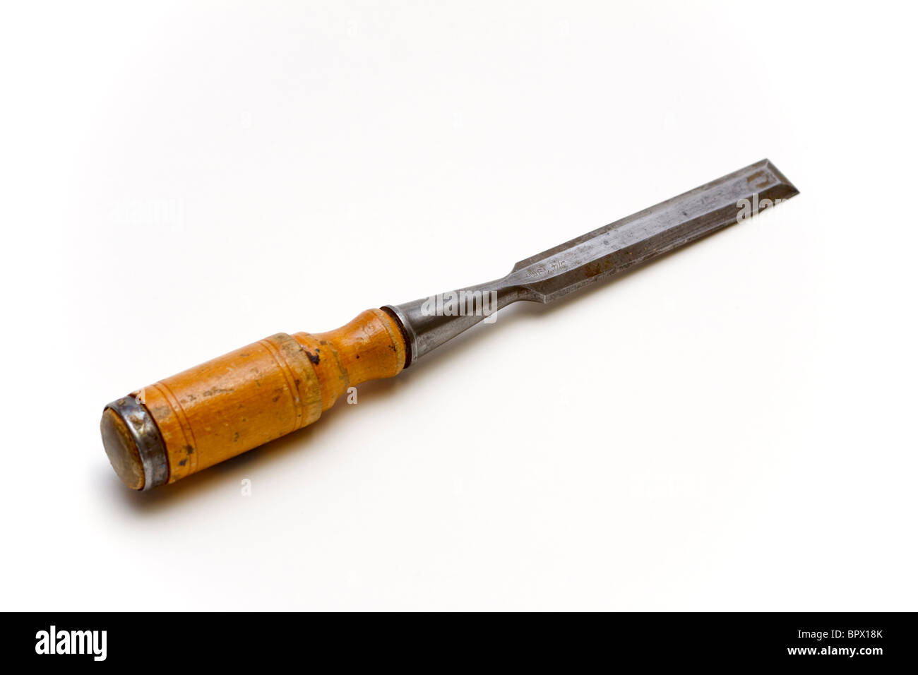 Chisel with a wooden handle on a white background Stock Photo
