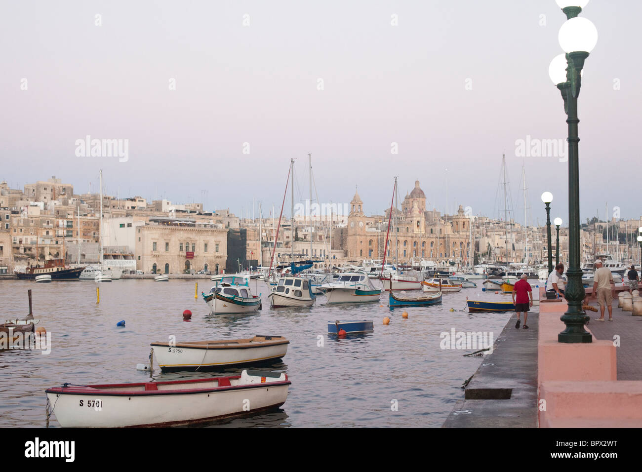 The Three Cities Malta harbour view at dusk Stock Photo