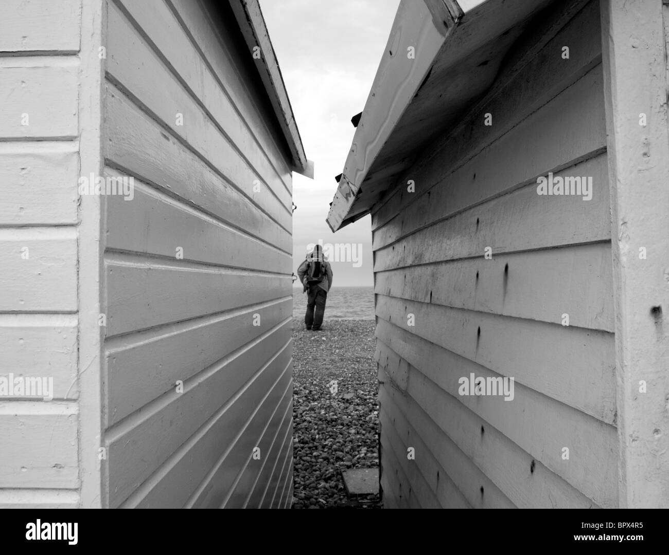 View between beach huts at Lancing, West Sussex, Southern England Stock Photo