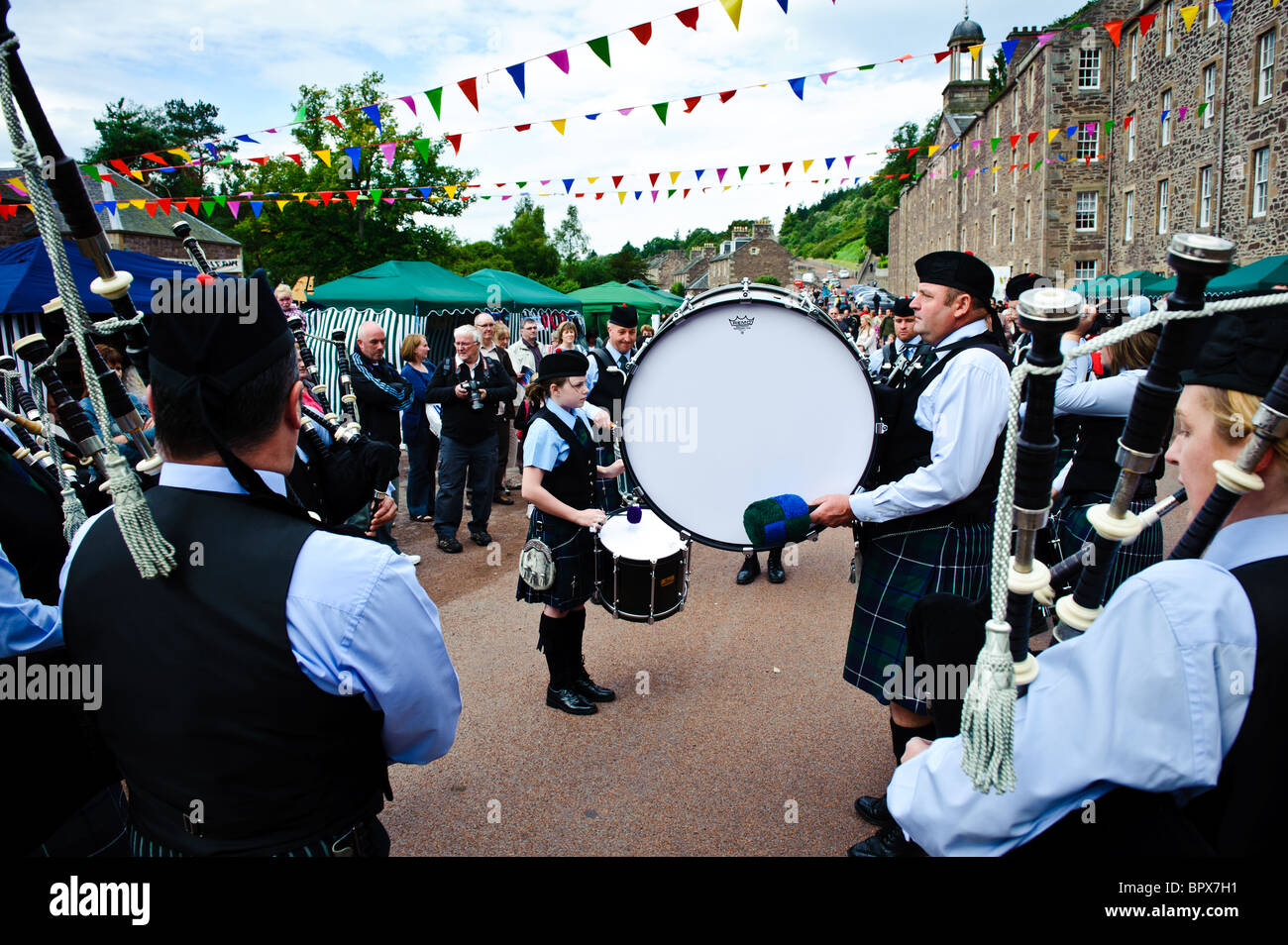 Lanark Pipe Band play at the Victorian Fair in new Lanark, Scotland Stock Photo