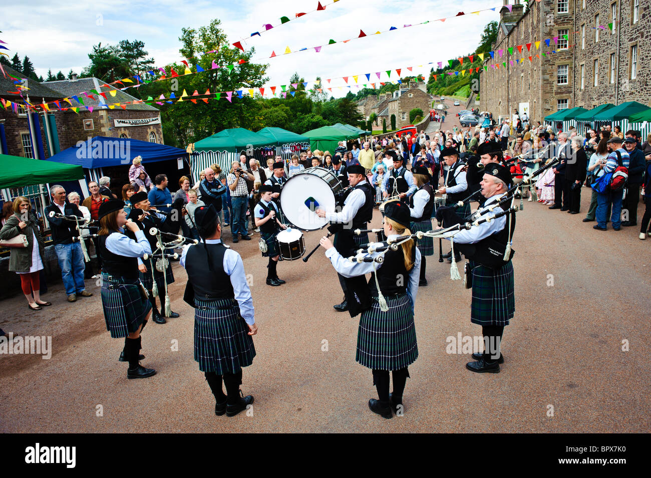 Lanark Pipe Band play at the Victorian Fair in new Lanark, Scotland Stock Photo