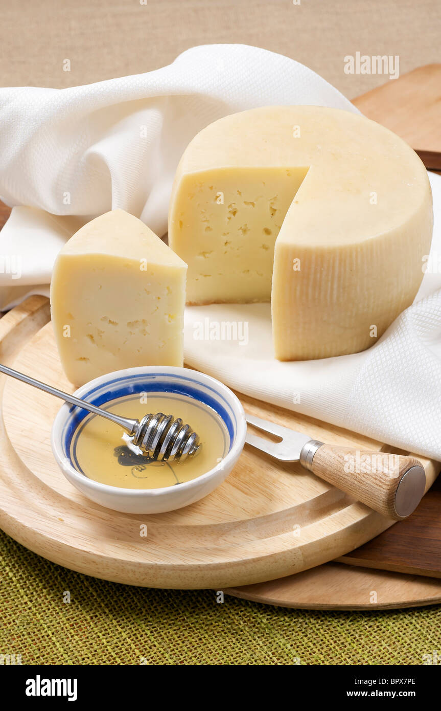 sheep milk cheese with honey Stock Photo Alamy