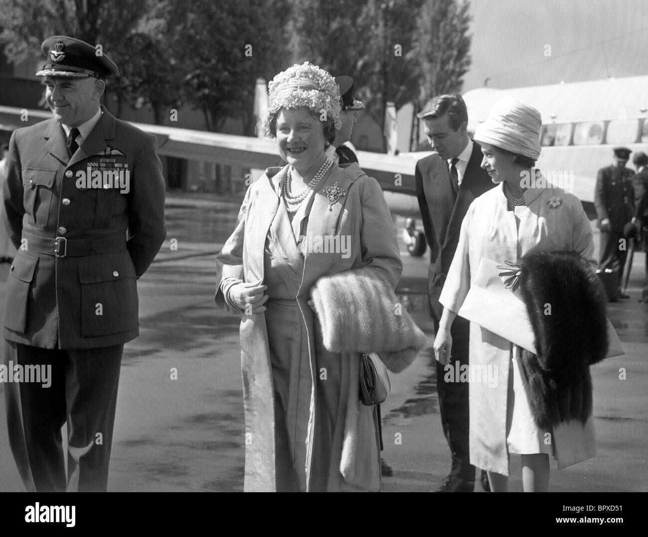 The Queen Mother and Princess Margaret with fur stoles and Tony Armstrong-Jones at RAF Cosford 2/5/1961 Stock Photo