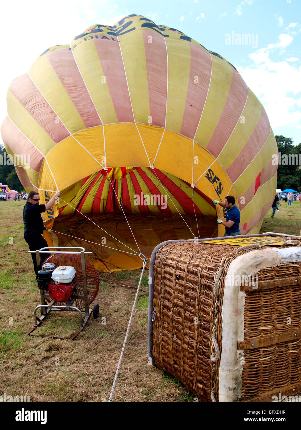 Inflating a hot air balloon at The 2010 Westcountry Balloon Fiesta, Tavistock, Devon. Stock Photo