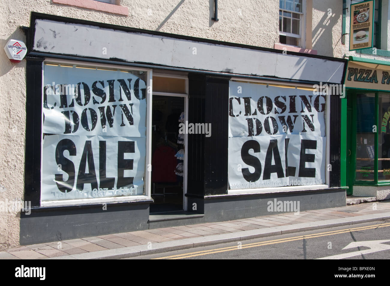 Closing Down Sale signs in shop window, Keswick Stock Photo - Alamy