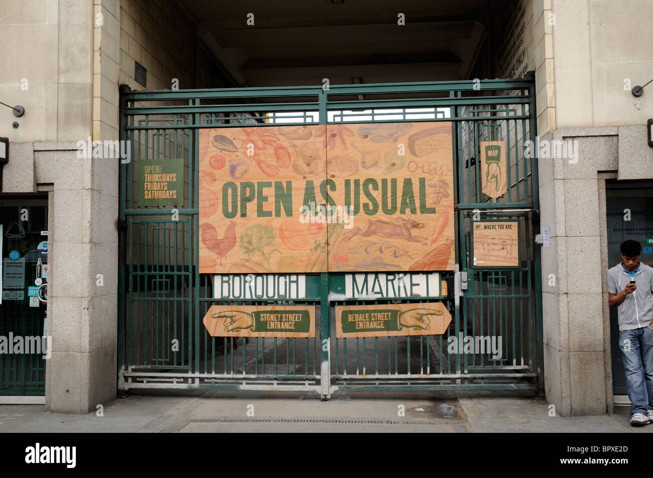 Open As Usual sign on main entrance of the Borough Market, SE1, London Stock Photo