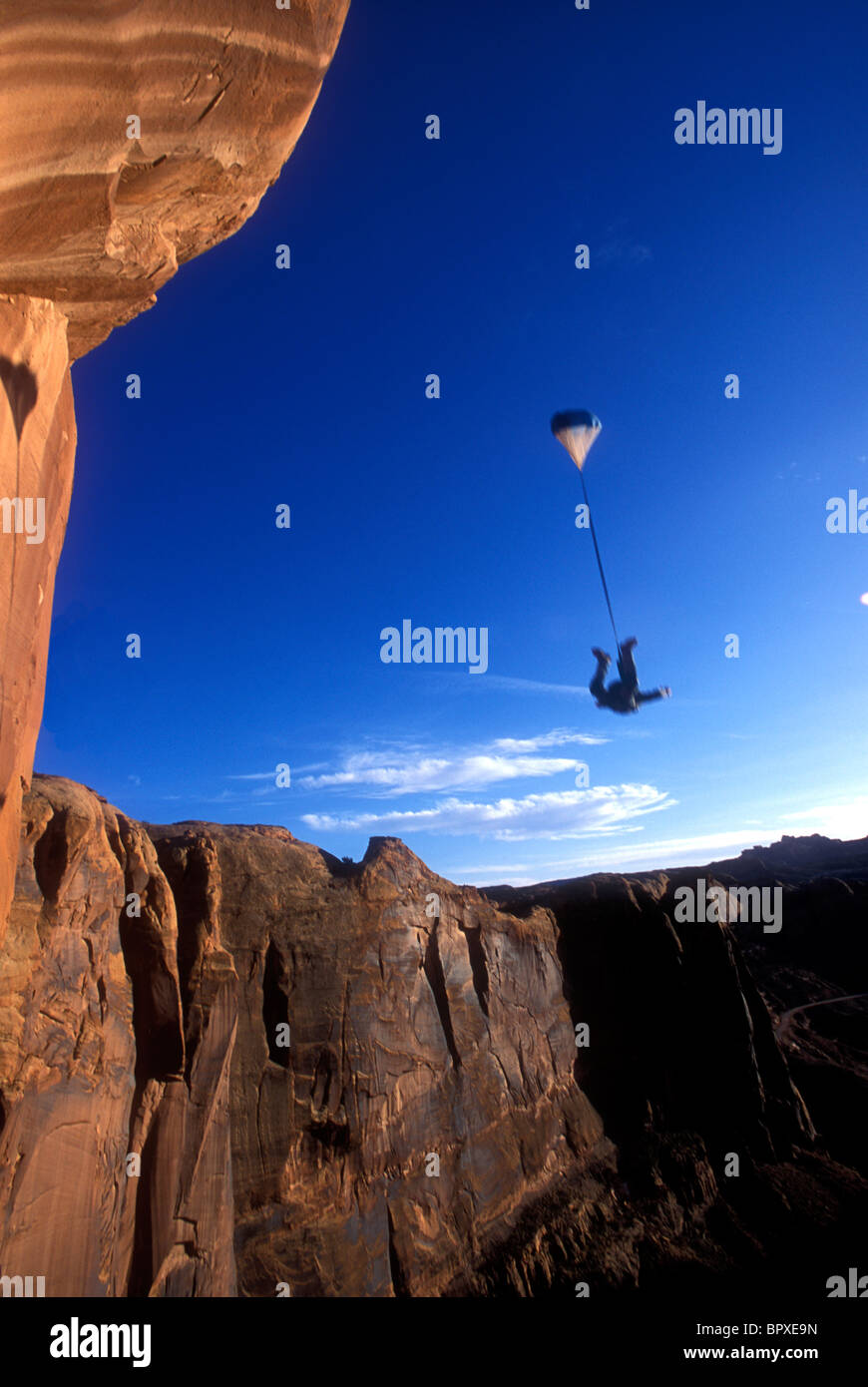 Man base jumping off the Tombstone, Utah, USA Stock Photo Alamy