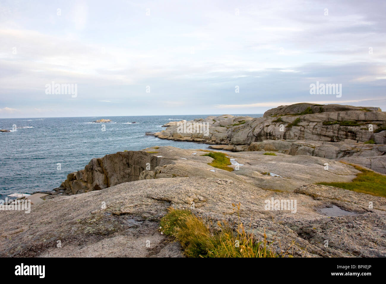 Rocky coastline with sea at Verdens Ende, Tjome, Norway. Stock Photo