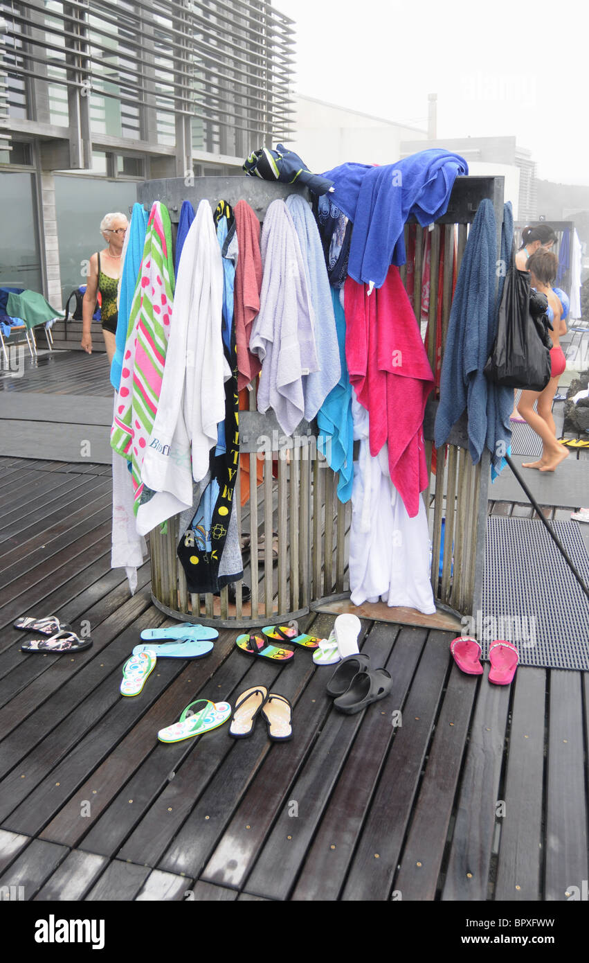 Towels hung up by guests of the Blue Lagoon outdoor geothermal seawater