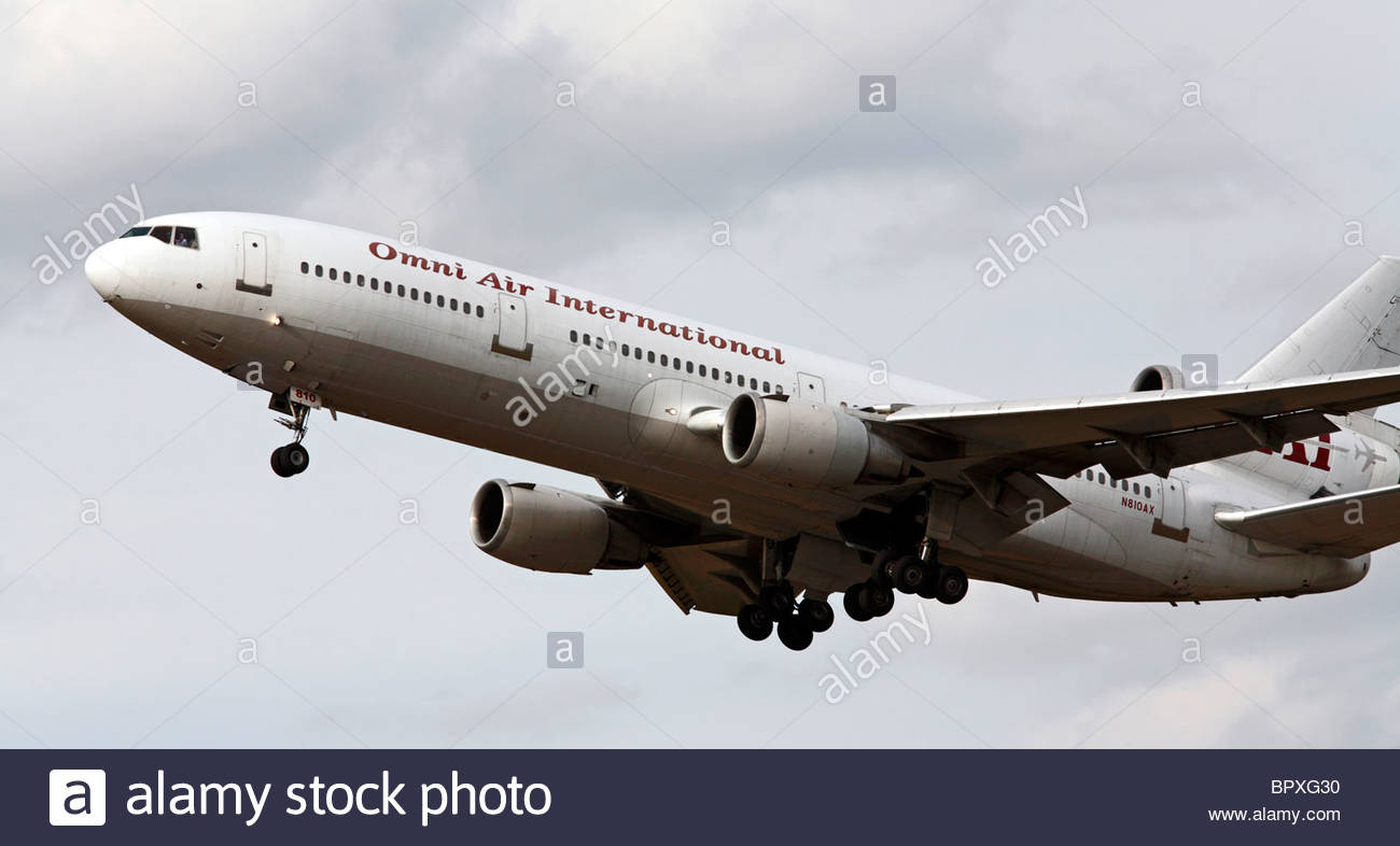 Omni Air International McDonnell Douglas DC-10 shortly after takeoff Stock Photo