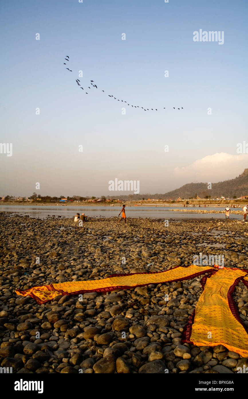 Sari on the river bank left to dry, Haridwar, Uttarakhand, India. Stock Photo