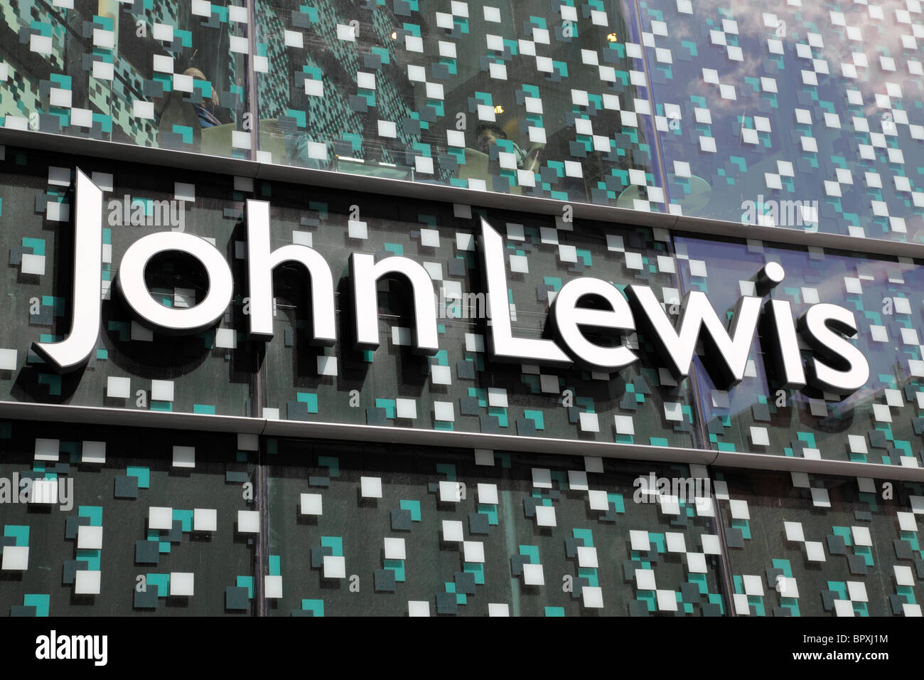 John Lewis sign on the side of it's modern store in The Hayes Cardiff Wales UK Stock Photo