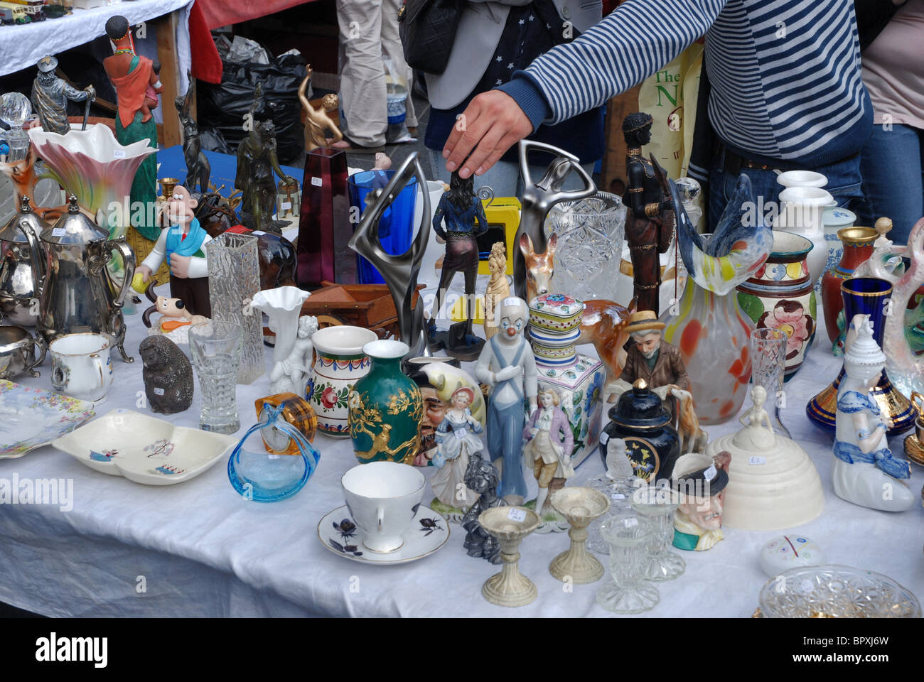 Bric-a-brac for sale on a stall in the Grassmarket during the annual Grassmarket Fair. Stock Photo