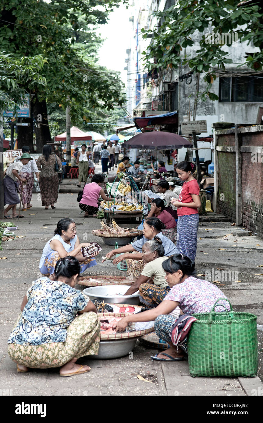 street market women food sellers Myanmar Burma Yangon Asia commerce Stock Photo