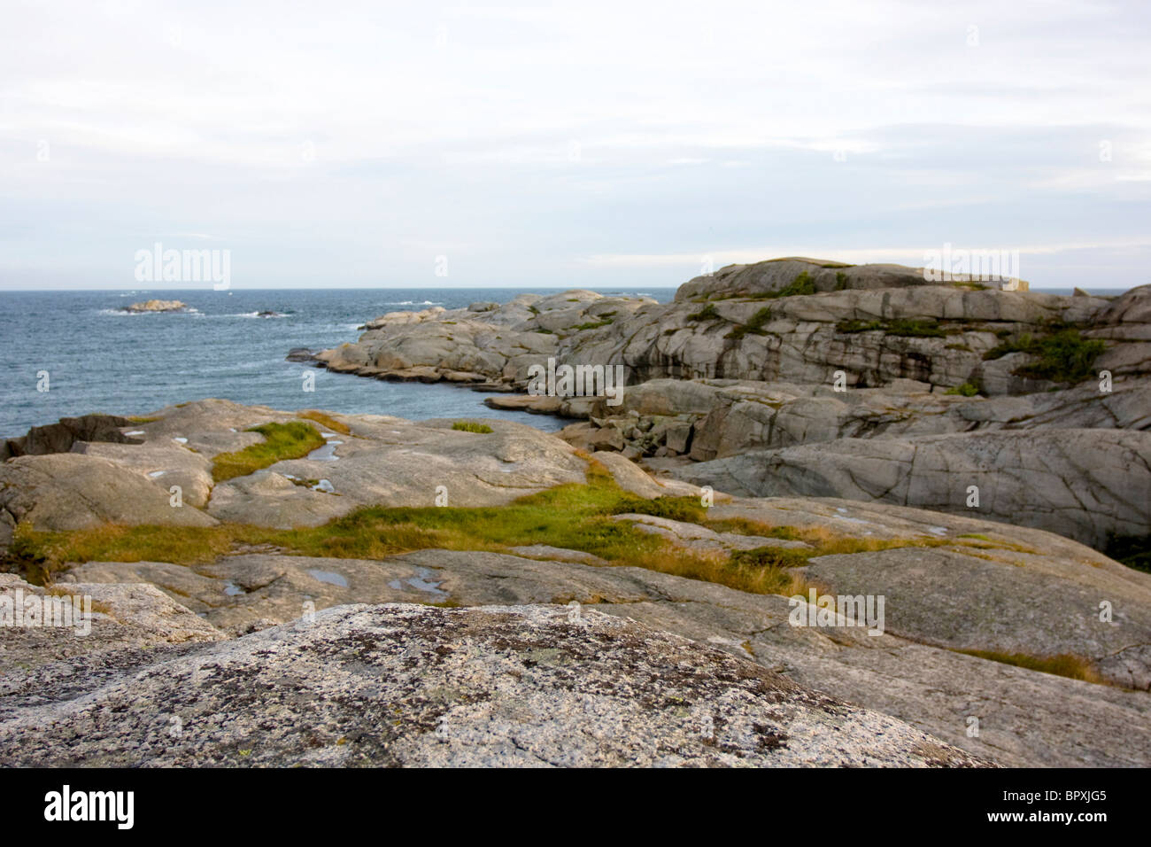 Rocky coastline with sea at Verdens Ende, Tjome, Norway. Stock Photo